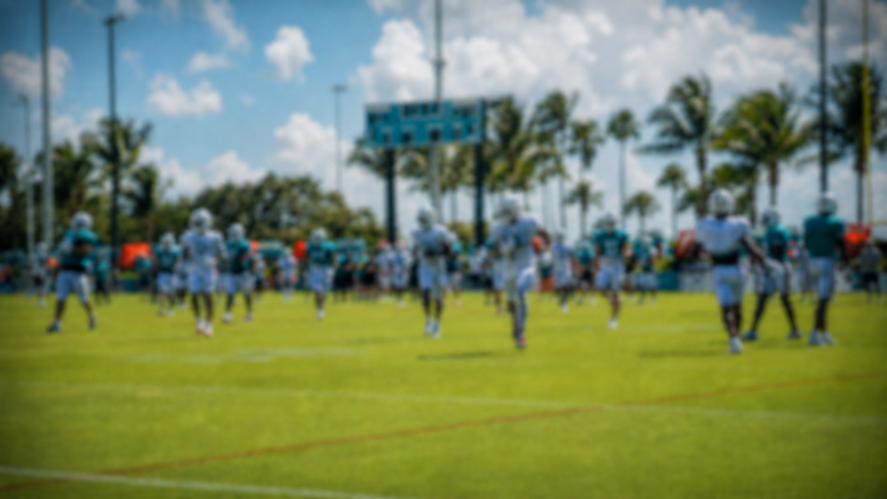 Blurred Miami Dolphins practice field for the 2026 practice squad tracker
