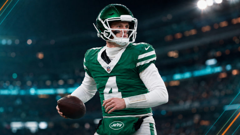 : Quarterback Brady Cook in a green No. 4 uniform after being claimed by the Miami Dolphins