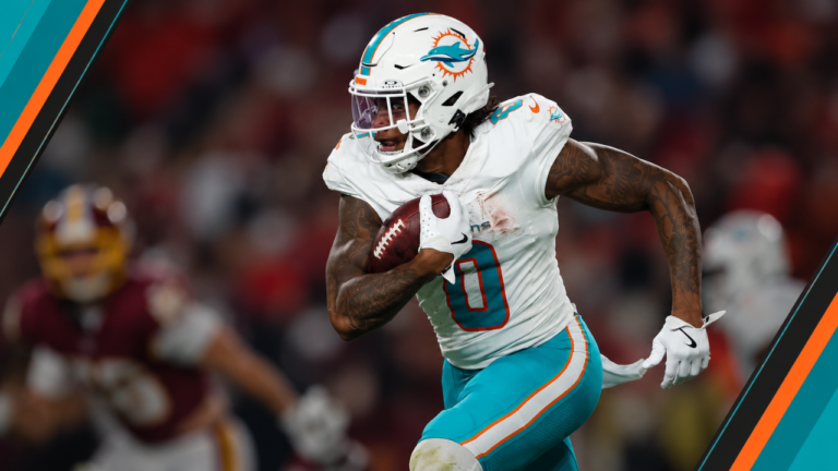 Miami Dolphins running back Ollie Gordon carrying the football